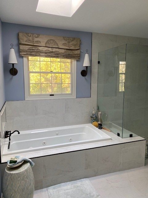 Owner's Bathroom in MD - the glass walls and tub ledge provides a bench seat for the shower.